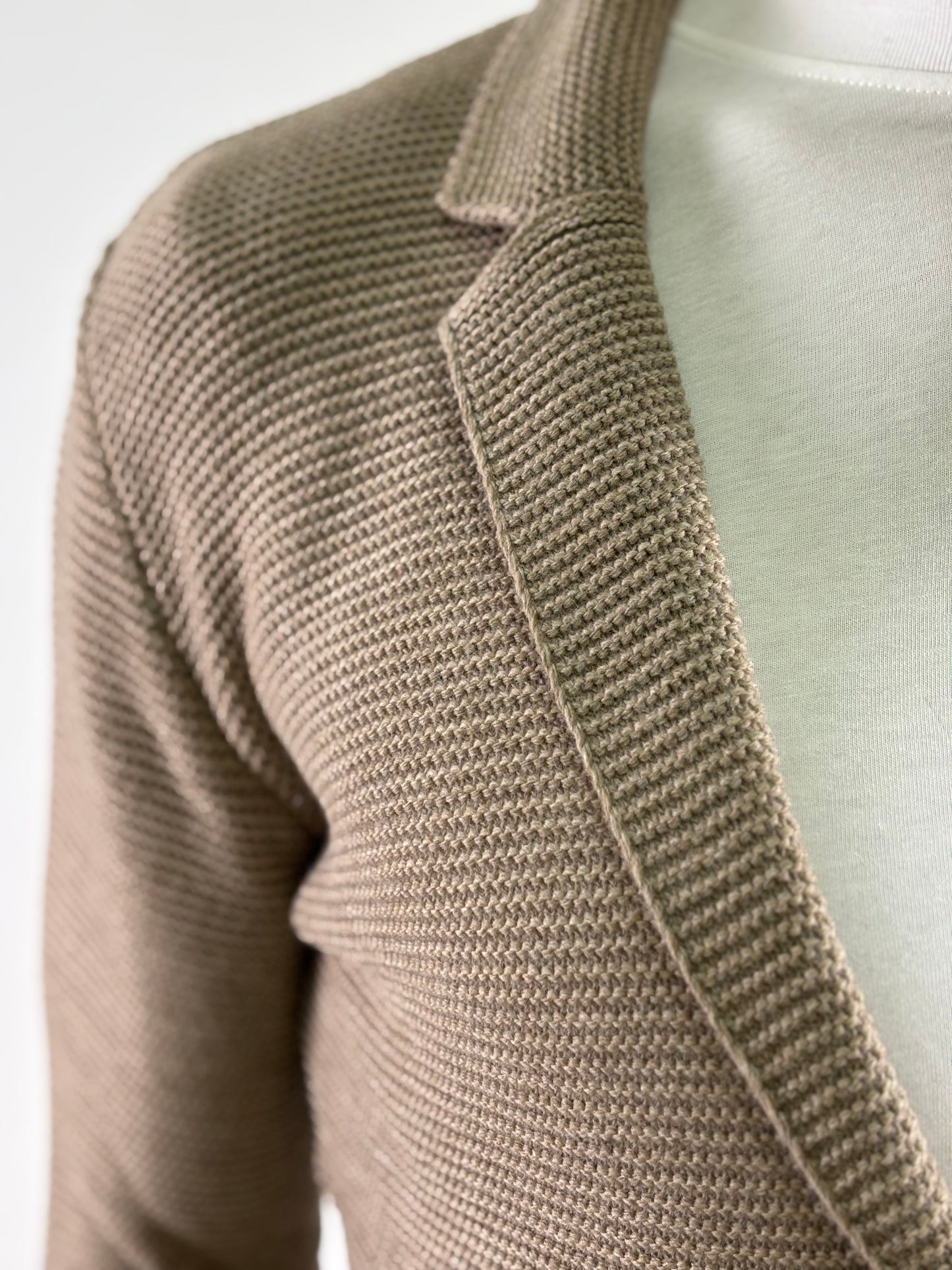 BL11 Giaccamaglia con tasche FANGO