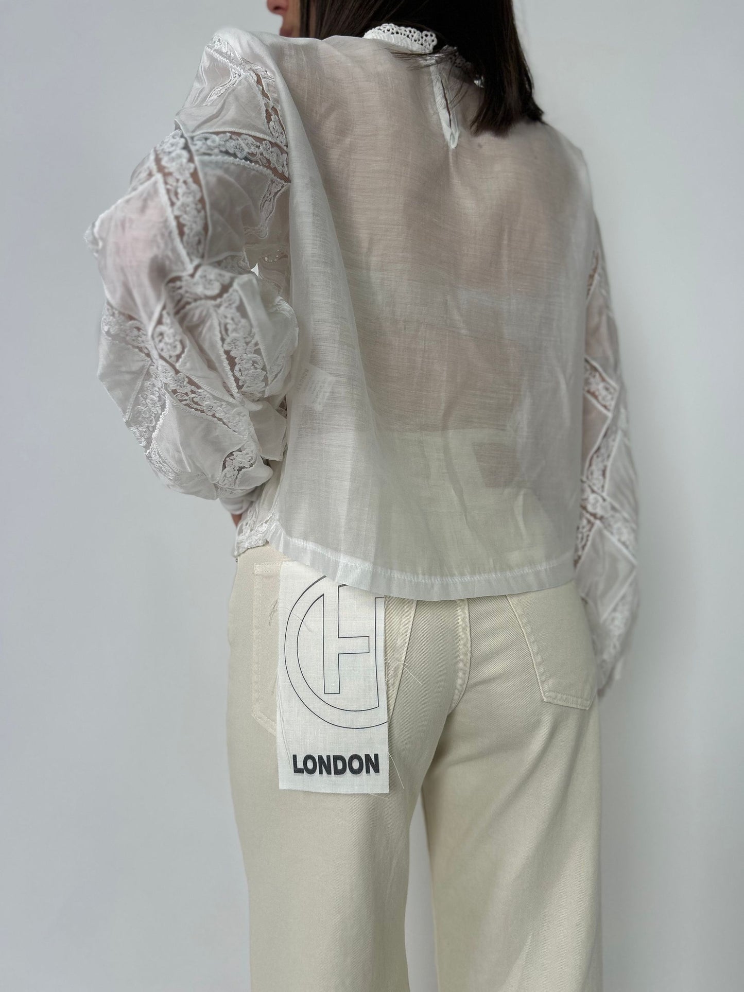 Blusa ml con dettagli in pizzo
