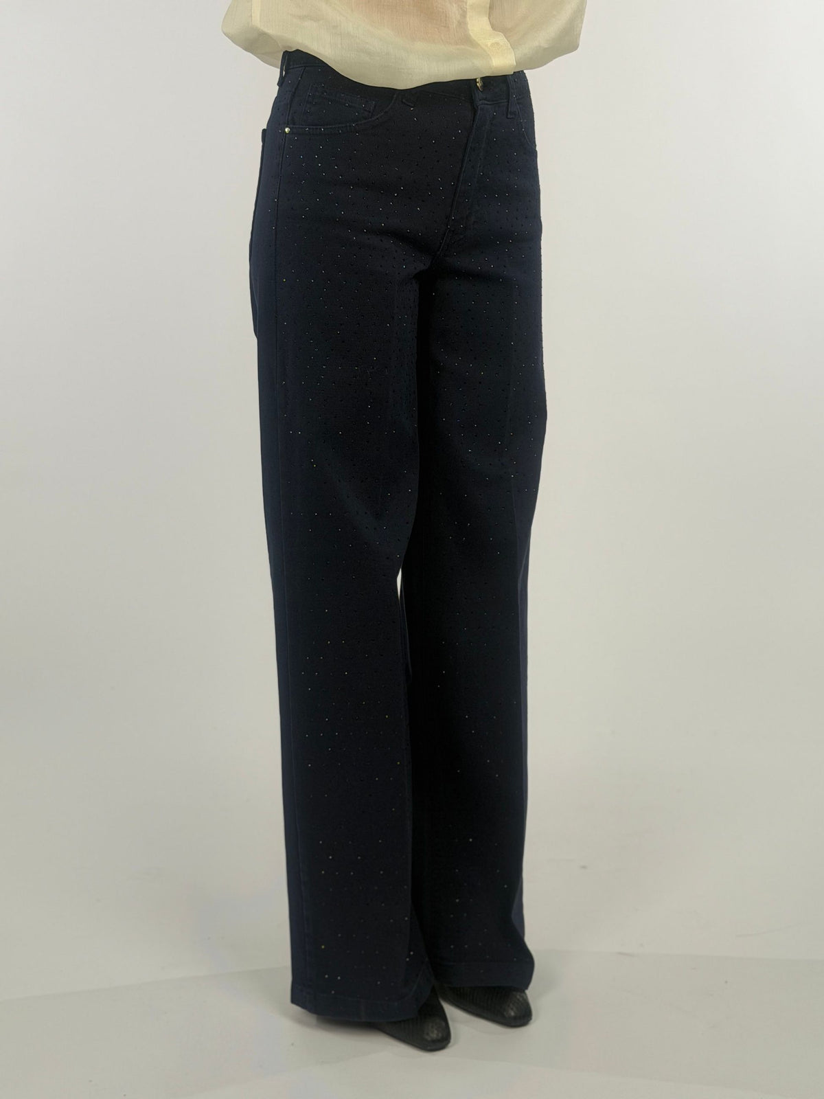 Pantalone cinque tasche con punti luce