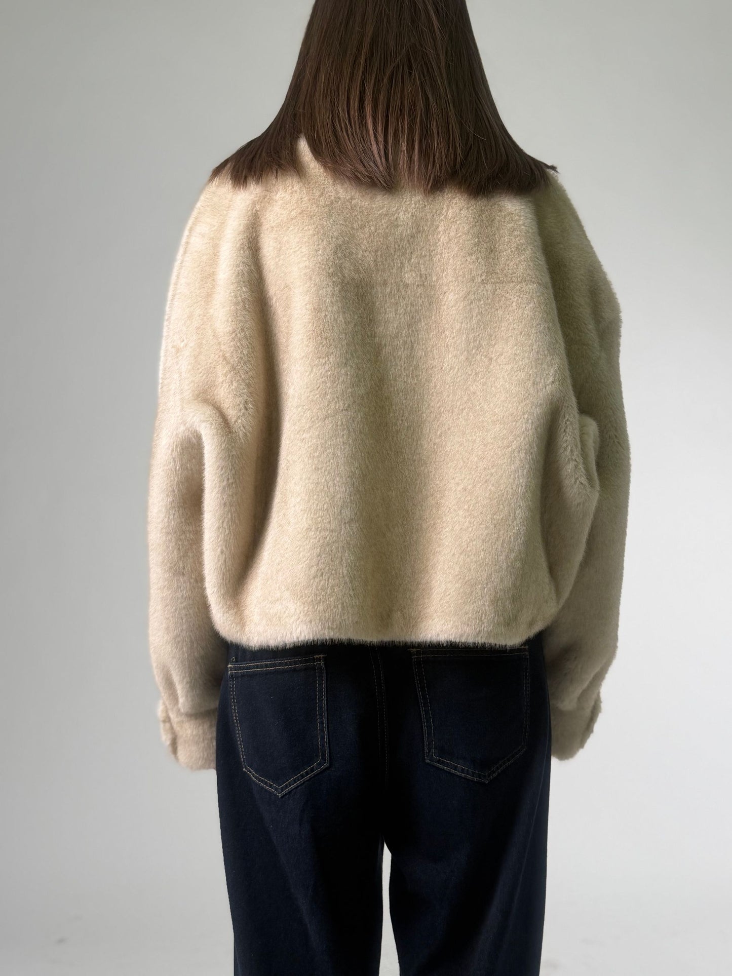 Simil pelliccia corta con zip
