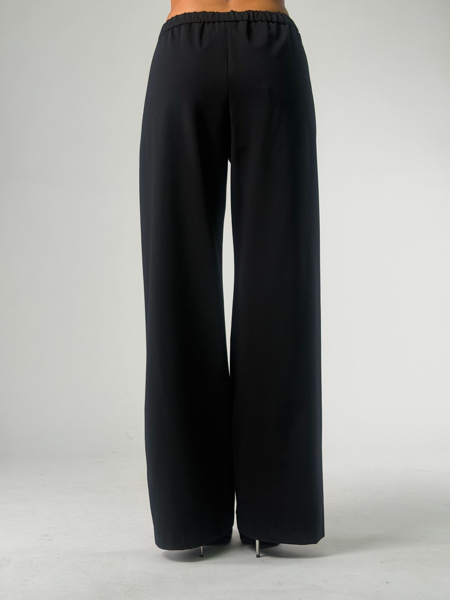 Pantalone palazzo con pence