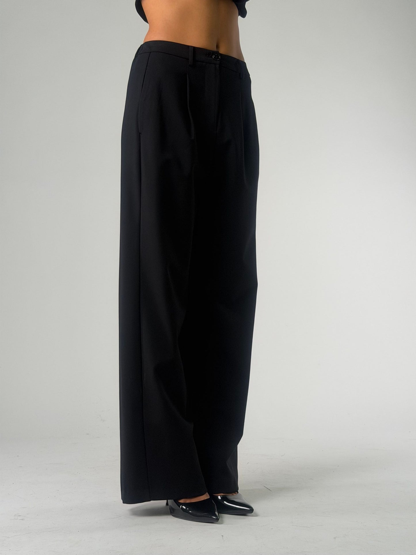 Pantalone palazzo con pence