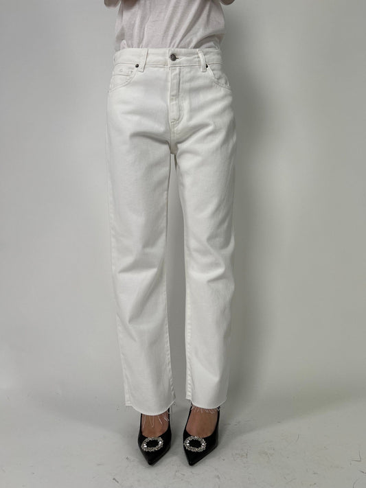 Pantalone cinque tasche a taglio vivo
