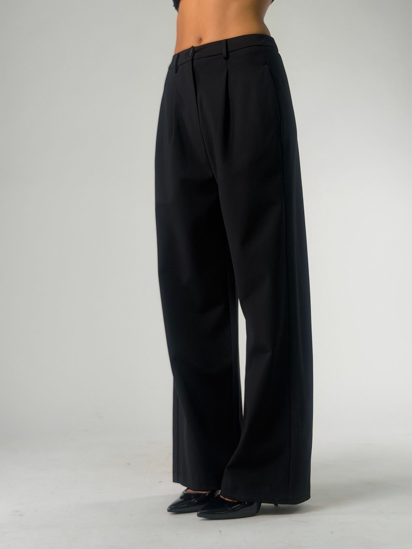 Pantalone palazzo con pence