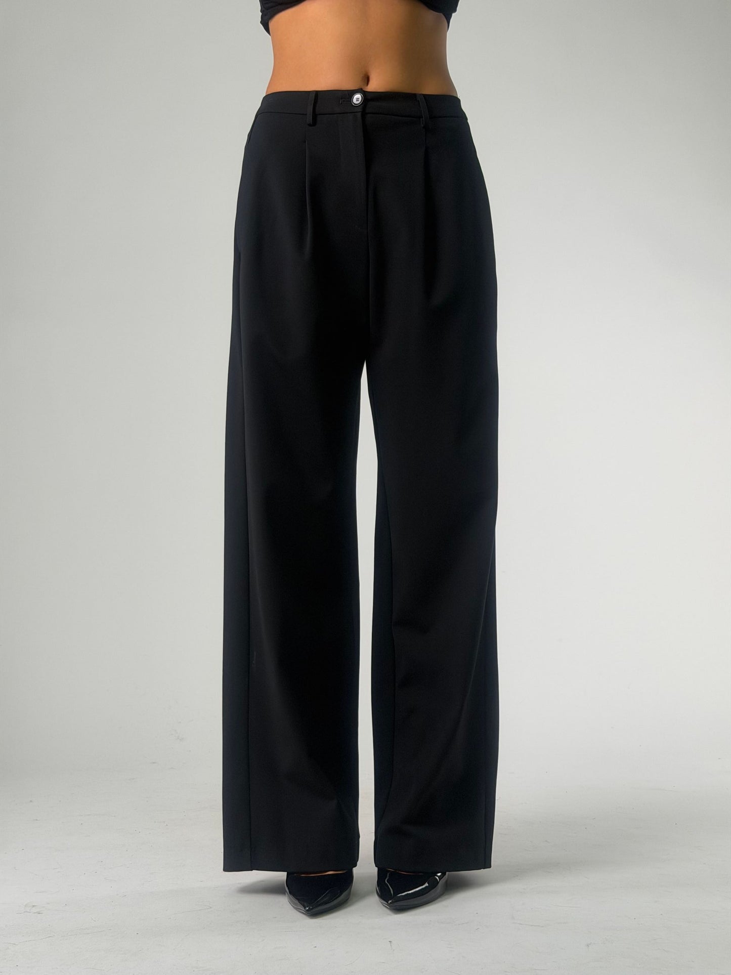 Pantalone palazzo con pence