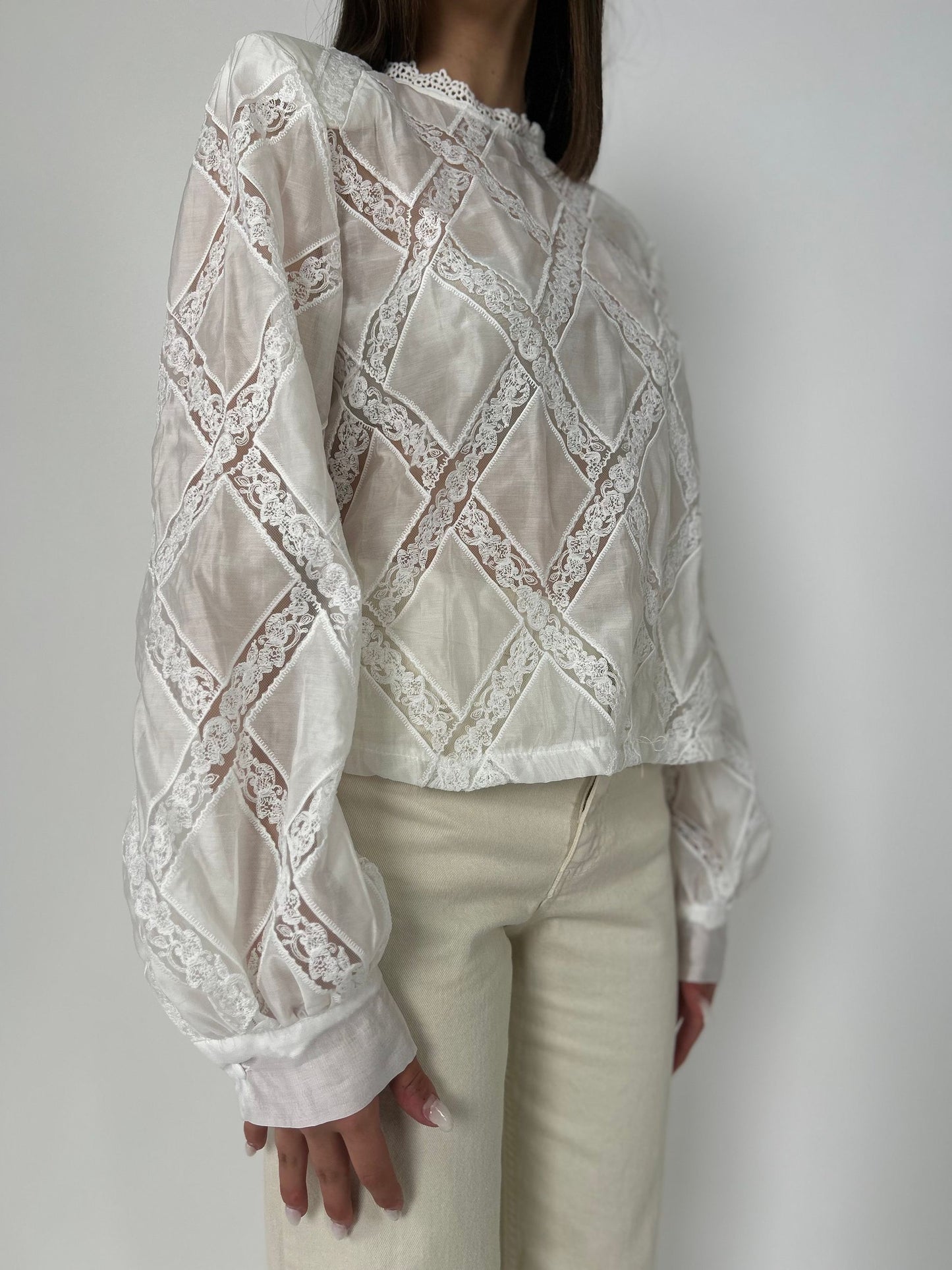 Blusa ml con dettagli in pizzo