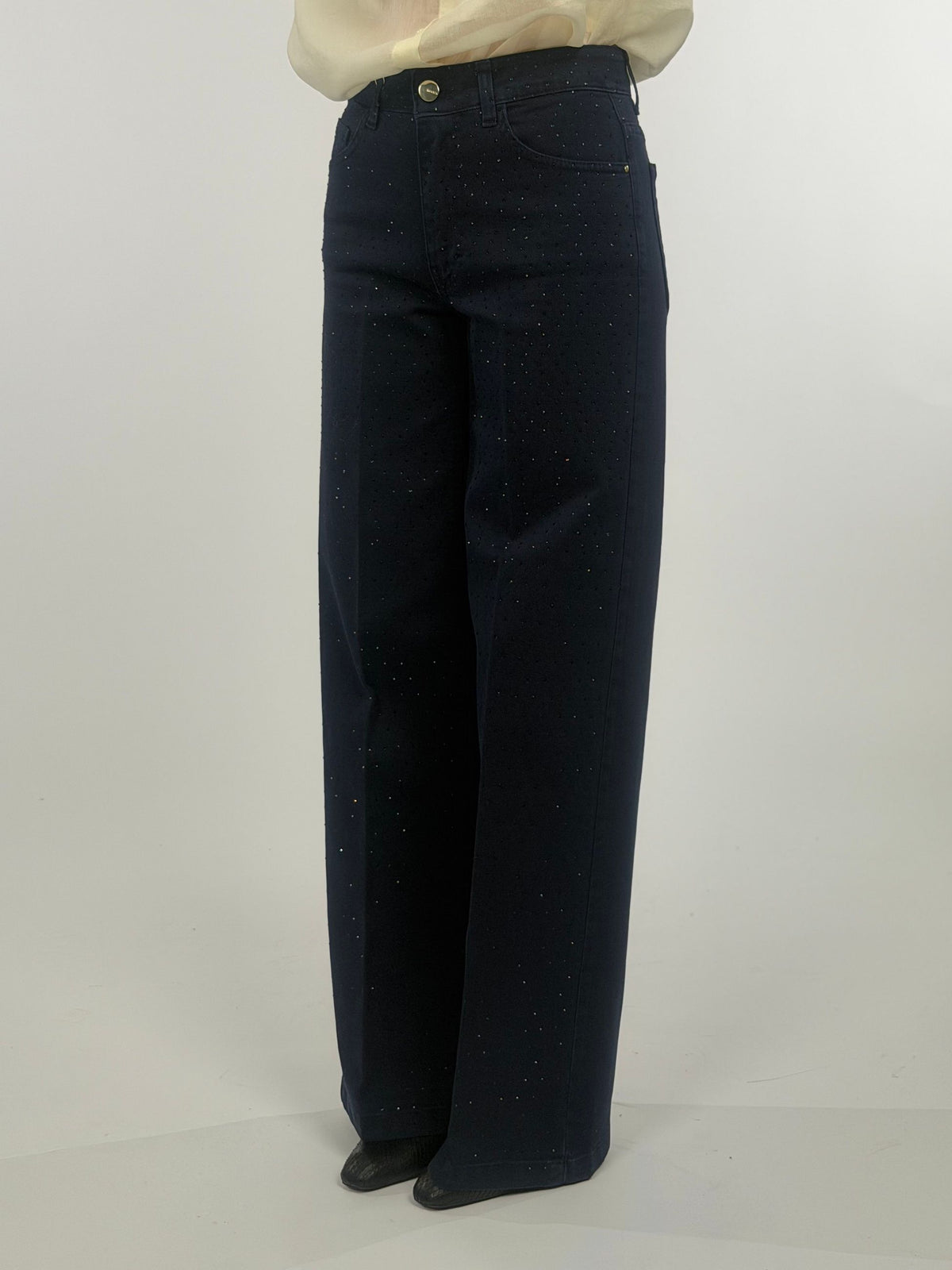Pantalone cinque tasche con punti luce