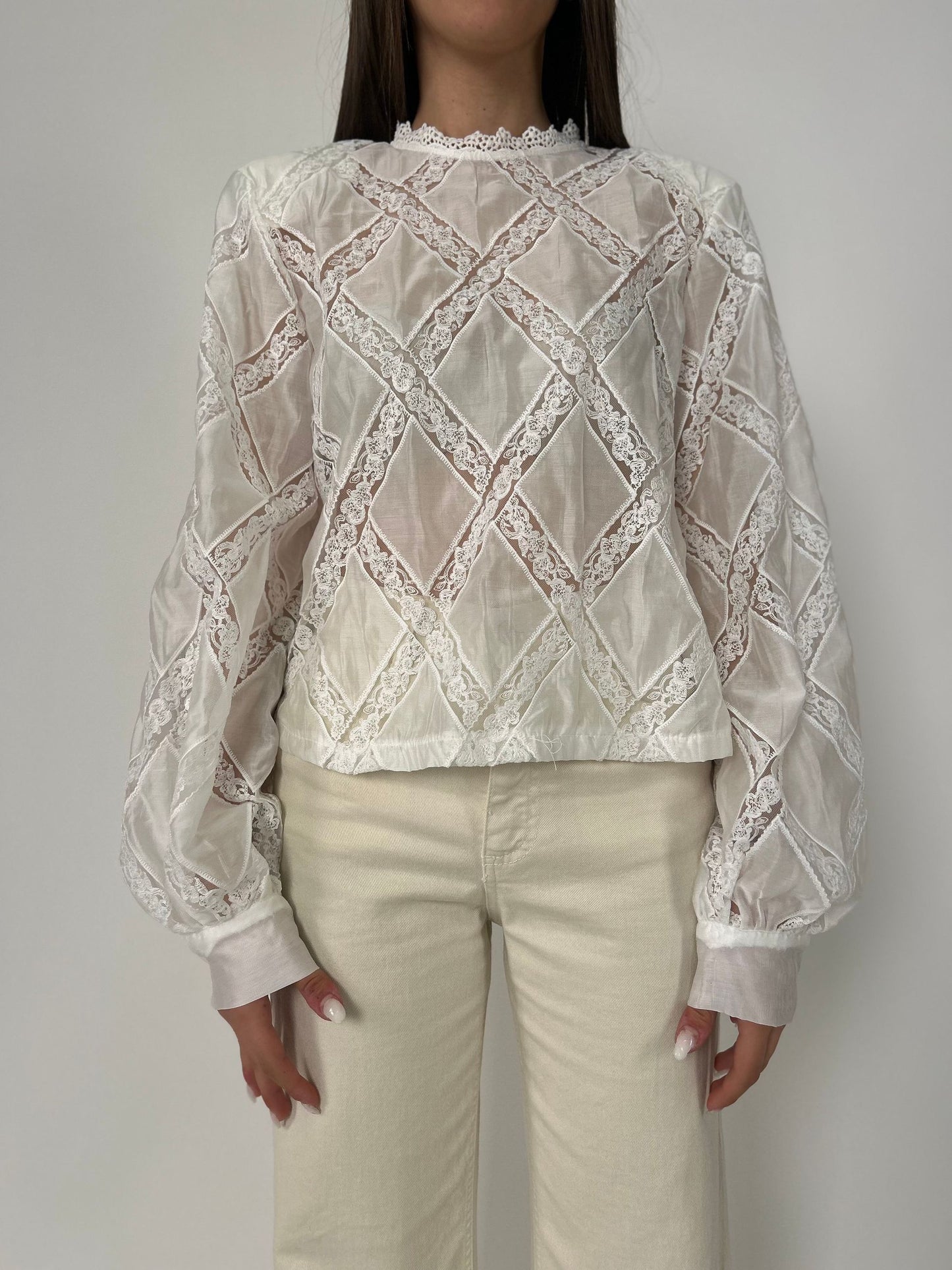 Blusa ml con dettagli in pizzo