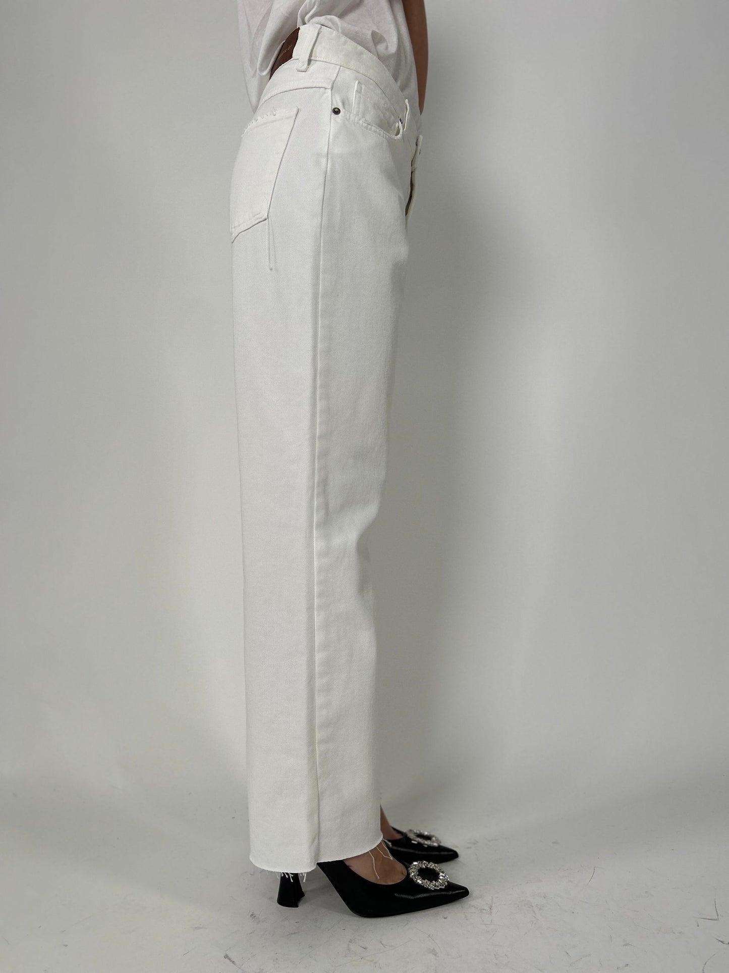Pantalone cinque tasche a taglio vivo