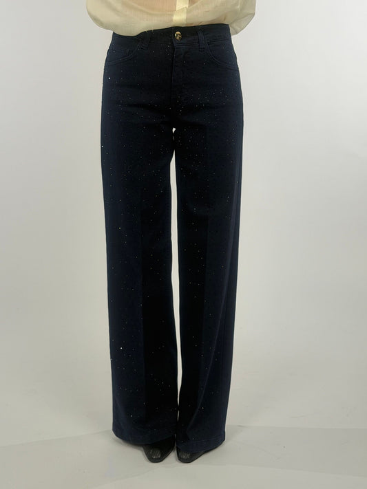 Pantalone cinque tasche con punti luce